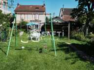 Maison avec jardin, à proximité du centre-ville — photo 2