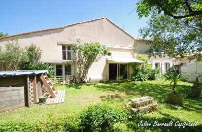 Maison en pierre de 186,64 m² avec 3 chambres rénovée en 1999 sur un terrain de 413 m² — photo du bien