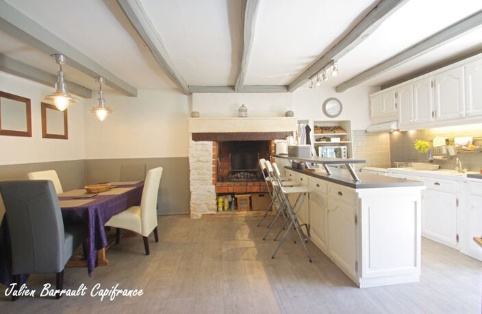 Maison en pierre de 186,64 m² avec 3 chambres rénovée en 1999 sur un terrain de 413 m² — photo 4