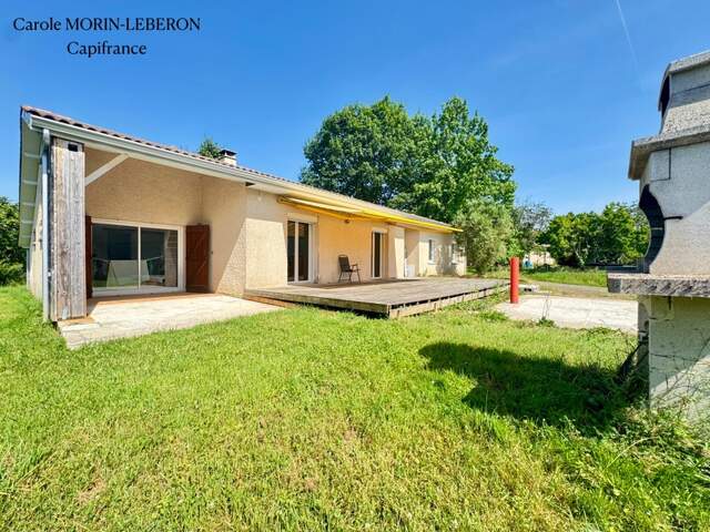 Maison de plain-pied, 4 chambres, double garage et jardin — photo du bien