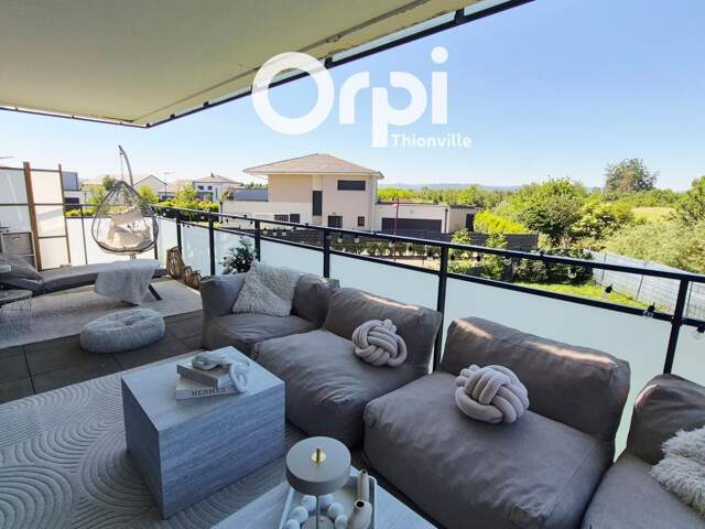 Appartement de 51m² avec terrasse de 21m², une chambre et deux places de stationnement — photo du bien