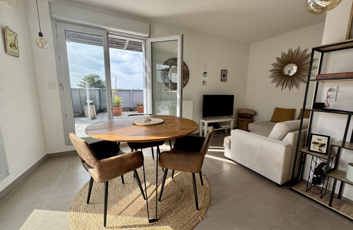 Appartement T 3 avec toit terrasse et double garage. — photo 3
