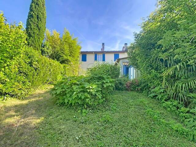 Une maison en pierre au cœur de Montaut-les-Créneaux — photo du bien