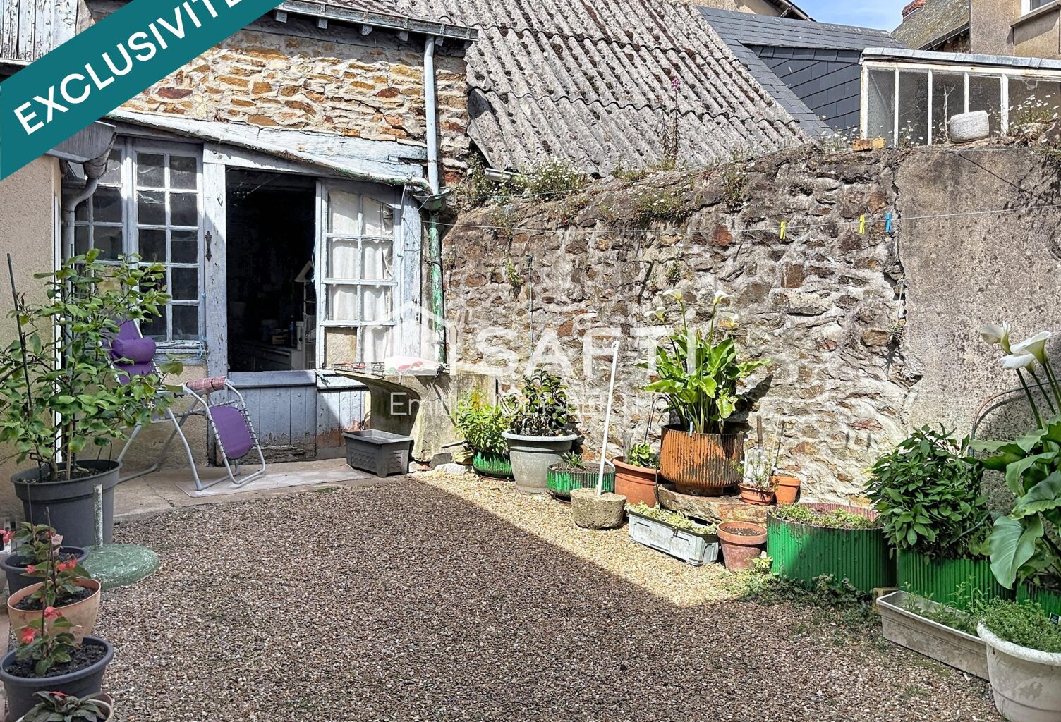 MAISON DE VILLE 97 M² - SECTEUR CENTRE VILLE MESLAY DU MAINE / 53170 — photo 1