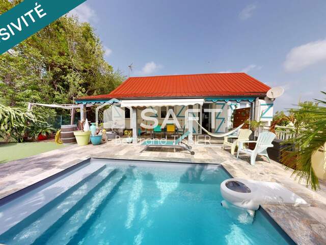 Maison sur deux niveaux, F4 et deux F2, piscine — photo du bien