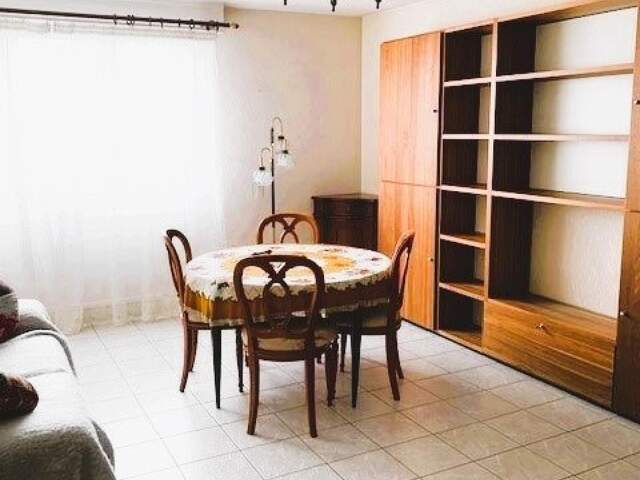 Appartement 2 chambres avec parking fermé — photo du bien