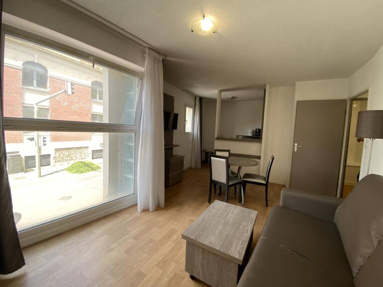 7 appartements (3 studios, 2 T1 et  2 T2) + 4 parkings — photo 1