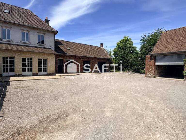 Ensemble immobilier composé d'une maison et d'un local commercial — photo 1