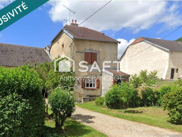 MAISON DE VILLAGE AVEC GARAGE ET JARDIN — photo du bien
