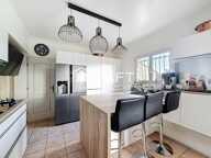 Maison T5 de plein-pied avec grand garage sur terrain plat 869 m² piscinable — photo 4