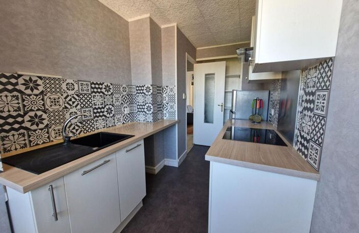 ROANNE - APPARTEMENT T3 — photo 3
