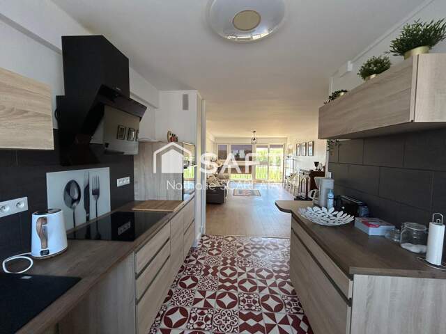 Appartement rénové de 72 m² avec 2 chambres, balcon et garage — photo du bien