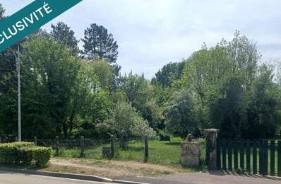 Terrain constructible clos et arboré. — photo du bien