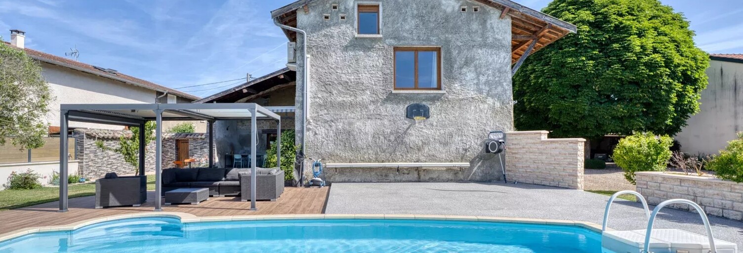 Maison 7 Pièces 203 m² à vendre à Niévroz (01120)
