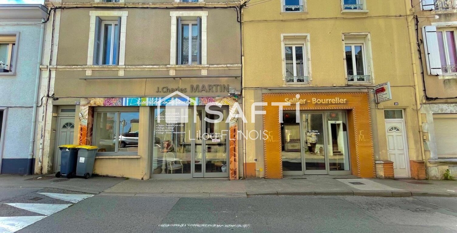 Immeuble à fort potentiel au coeur de Parthenay ! — photo 1
