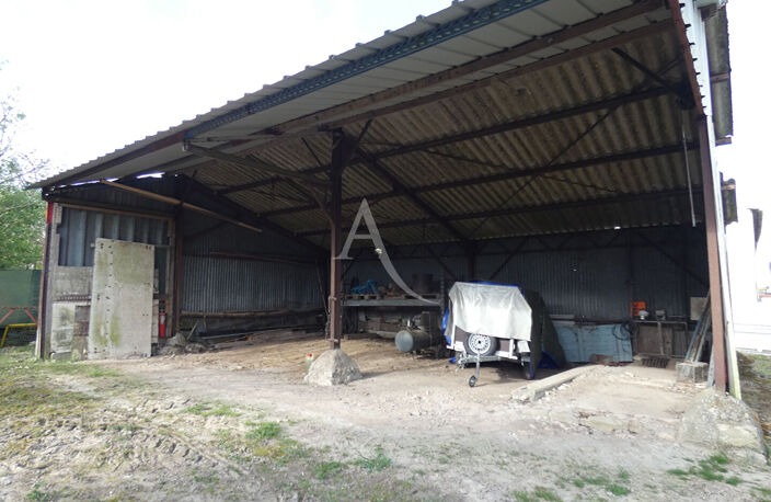 Terrain de 1 000 m²  avec Mobil home, 2 hangars  Outarville — photo 3