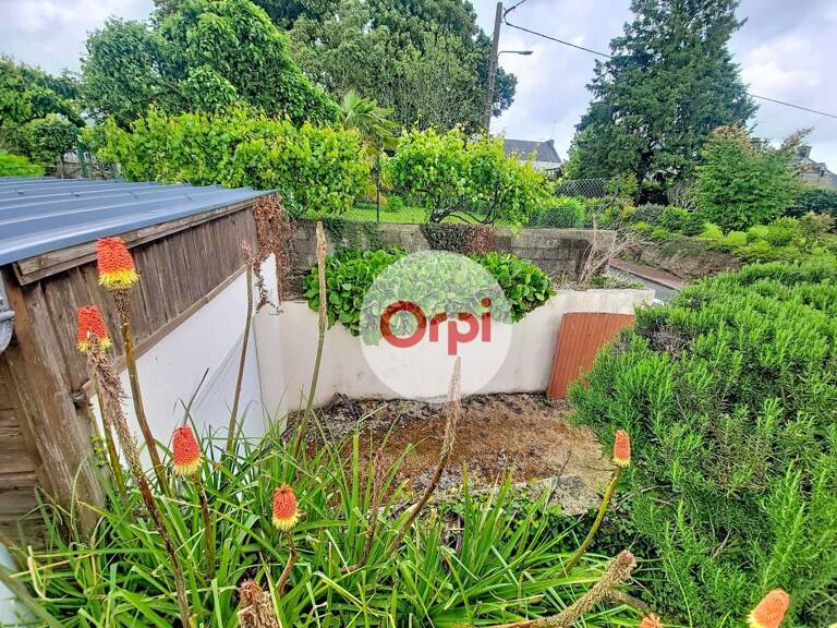 Terrain constructible + garage à vendre — photo 1