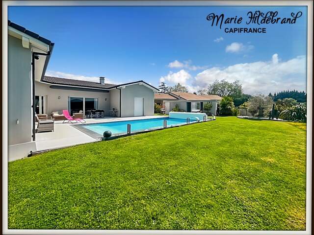 MURET – Villa contemporaine 134 m² – Séjour cathédrale, jardin 1000m², piscine & vue dégagée — photo du bien