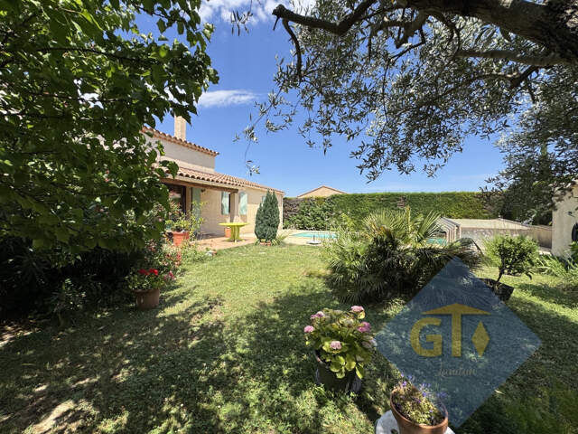 Maison de plain-pied 4 chambres avec piscine et grand garage — photo du bien