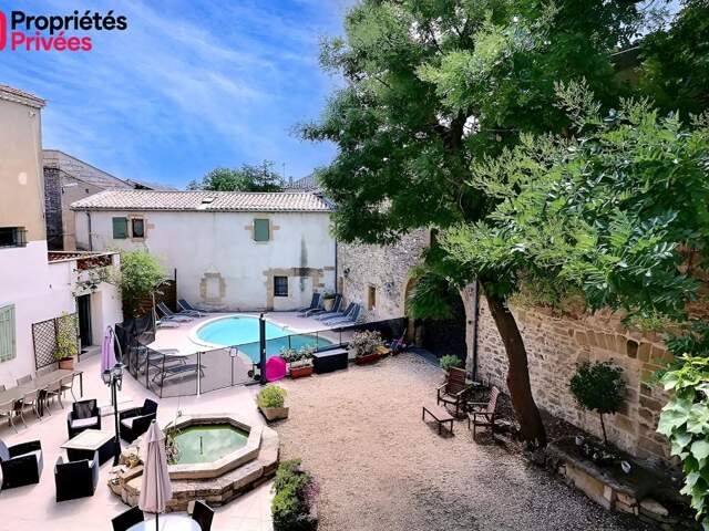 Aux portes d'Uzès, une authentique bastide du XVIIIe siècle pensée pour recevoir" — photo du bien