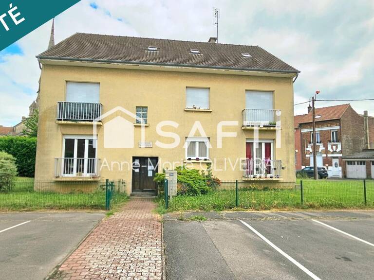 Immeuble en monopropriété offrant un bon rapport : avec 5 lots, garages, caves, jardin, stationnement ext, poche gare et commodités. — photo 1