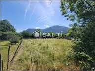 A Fronsac Terrain constructible de 737m²,  plat et clos sur trois côtes et vue sur les montagnes. — photo 3