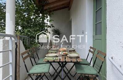 Appartement avec cave terrasse cour et local commercial — photo du bien