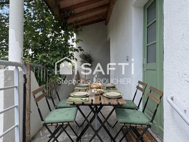 Appartement avec cave terrasse cour et local commercial — photo du bien