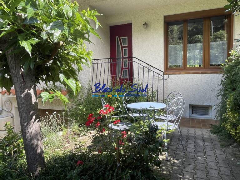 Maison avec garage et jardin arboré — photo 1
