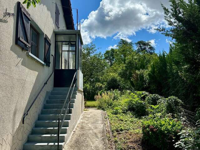 Maison de bourg de 54m2 avec un beau jardin — photo du bien