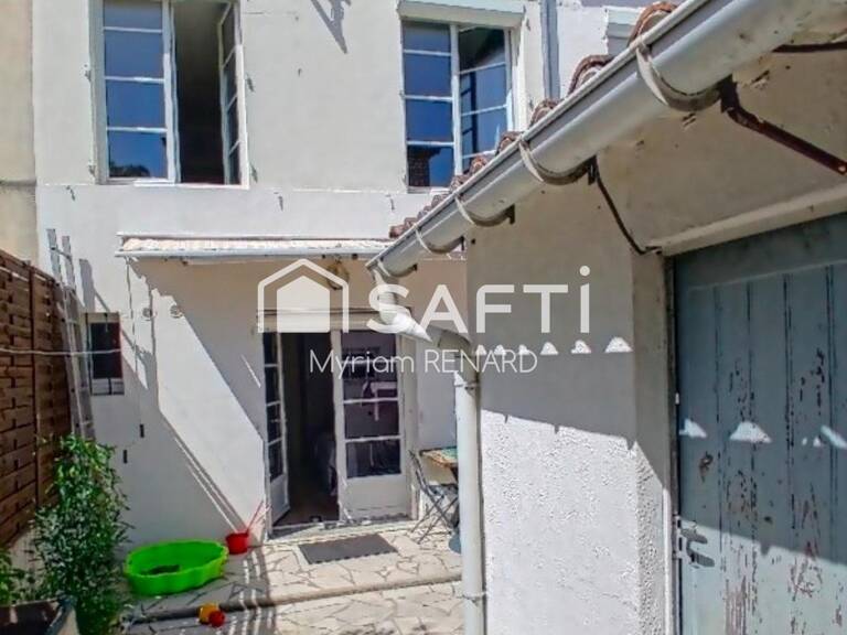 Investissement locatif sécurisé: Maison T3 louée, emplacement stratégique à Saintes ! — photo 1