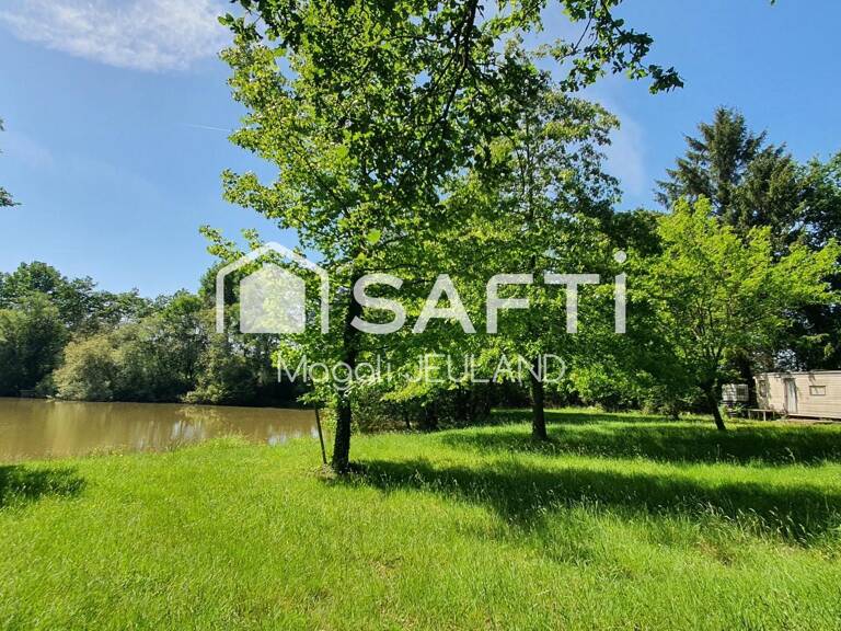 ÉTANG avec deux TERRAINS DE LOISIRS ou pré,  presque 2 HECTARES ,cours d'eau ,  taillis , et prairies — photo 1