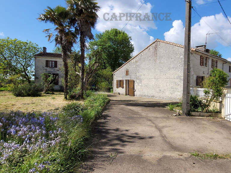 Ensemble immobilier : maison + gîte + annexe + garage, atelier et jardin clos à  NIEUL LES SAINTES (17) — photo 1