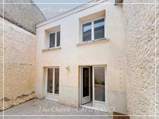Maison de ville à vendre VIC FEZENSAC (32) scindée en 2 logements loués avec terrasse, balcon, garage — photo du bien