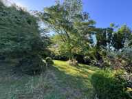 Maison familiale avec dépendance en pierre et terrain arboré à Spézet — photo 2