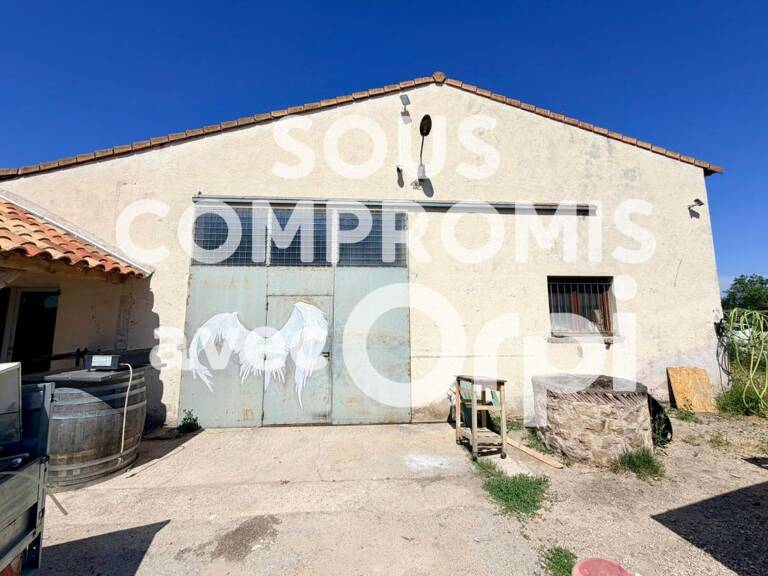 EXCLUSIVITÉ VAUVERT (30600) – Ensemble Immobilier Polyvalent : Entrepôt, Appartement & Grand Terrain — photo 1