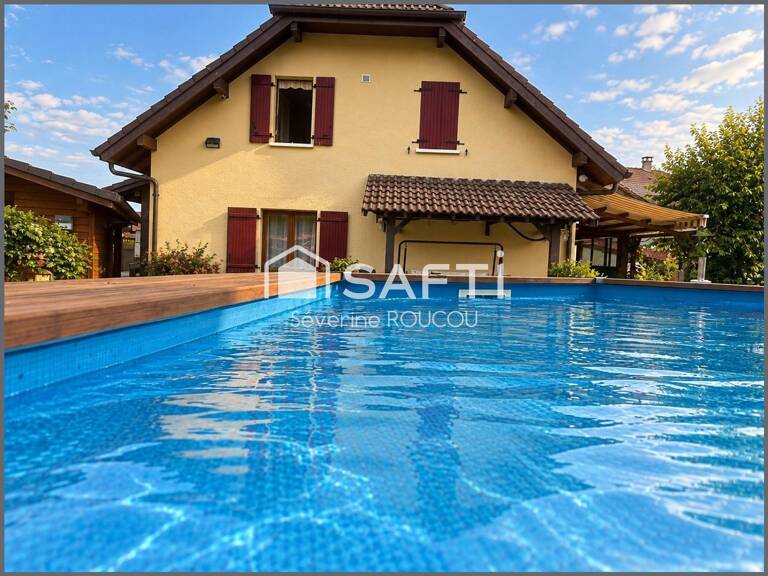 Rare sur le secteur, aux portes de Genève et proche de la Suisse, découvrez cette belle maison familiale lumineuse, aux volumes généreux et aux prestations modernes, nichée dans un environnement calme et verdoyant avec piscine. — photo 1