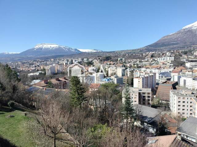 Appartement en rez de chaussée de 70m² avec terrasse,cave,parking privatif  sur les hauteurs de Gap — photo du bien
