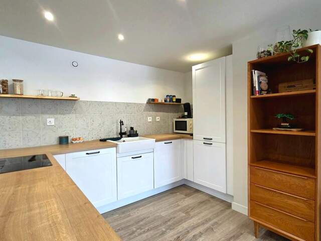 106m² - 3 chambres - exterieur - parkings — photo du bien