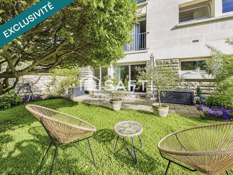 RARE : APPARTEMENT, JARDIN, CAVE ET PARKING — photo 1