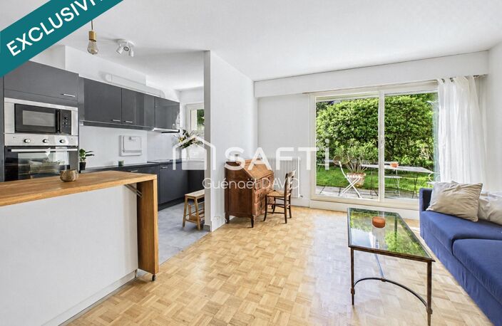 RARE : APPARTEMENT, JARDIN, CAVE ET PARKING — photo 2
