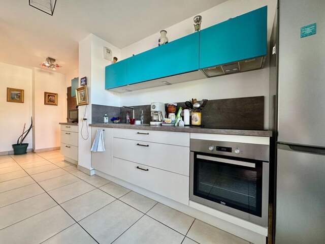 Appartement T3 récent avec balcon et garage Secteur recherché de Décines-Charpieu — photo du bien