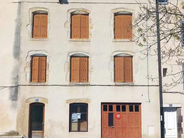 Maison de ville 88 m² avec garage, grenier aménageable et fort potentiel d'investissement – Quartier du Moutier à Thiers — photo du bien