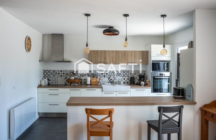 Coup de cœur pour cette maison rénovée avec belle terrasse et garage — photo 4