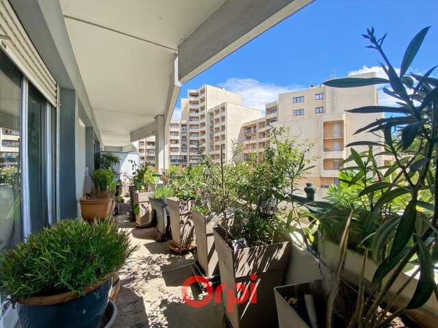 T5 de 106 m² – Dernier étage – Traversant Est/Ouest – Environnement privilégié — photo du bien
