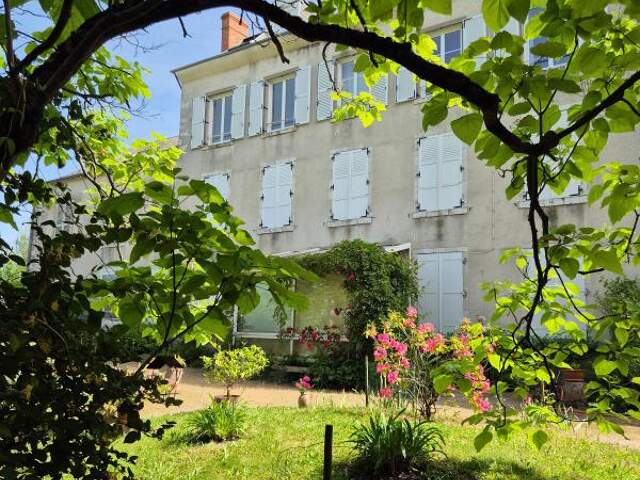 Duplex avec parking garage et jardin — photo du bien