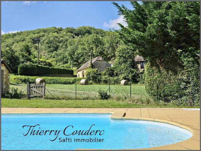 Maison en pierre avec gîte et piscine. — photo du bien