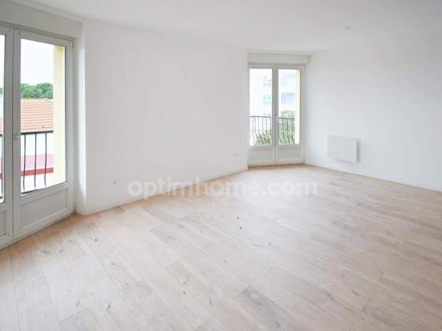 APPARTEMENT DE 97.6M2 AVEC 3 CHAMBRES, 2 SALLES DE BAIN, PARKING, BALCON, CAVE — photo du bien