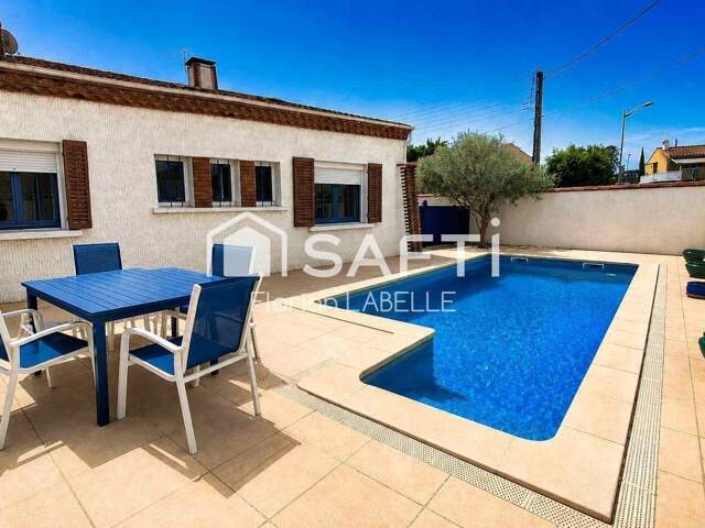 Villa F5 de 112 m² avec garage et piscine — photo du bien