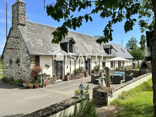 Maison, style Longère en pierre, avec terrain tout autour et une dépendance idéale pour gîte — photo du bien